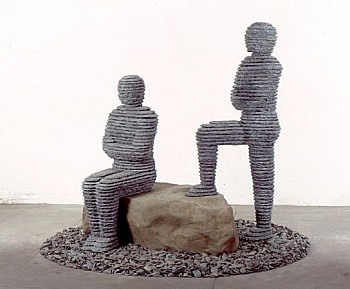 Boaz Vaadia Asa and Yehoshafat (#64) (2000), a bronze and bluestone outdoor sculpture featuring two stacked-stone human figures on a boulder. A striking modern figurative artwork incorporating natural elements and minimalist design